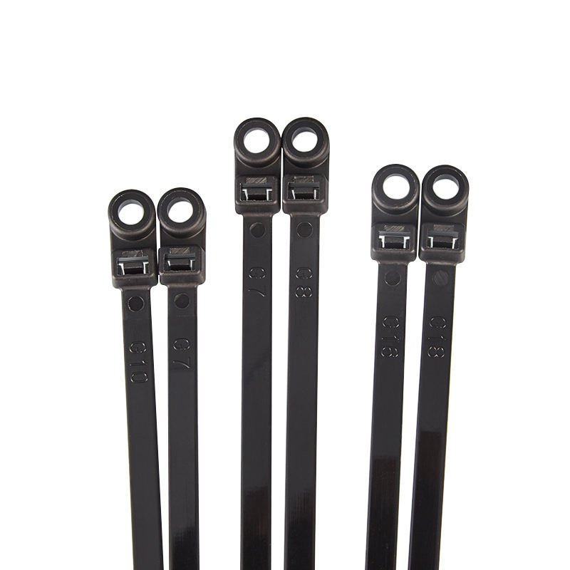 Close up view of heavy duty black nylon zip ties showing industrial cable ties used for secure fastening and cable management applications